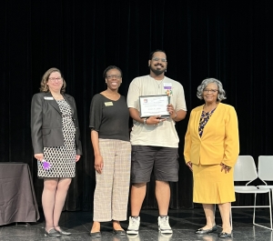 Outstanding Alternative Break Student receiving award