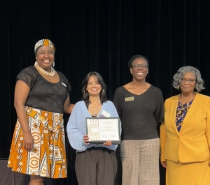 Campus Compact Newman Civic Fellowship recipient on stage