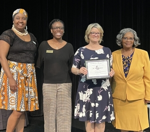 The Deborah K. Renzi Social Advocacy Award winner on stage