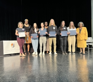 Outstanding Service-Learning Course, 20 hours or Less, student, instruct, and partner receiving award