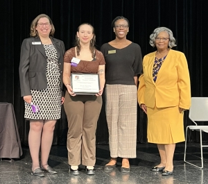 The Frederick Howe Outstanding Student Volunteer student receiving award